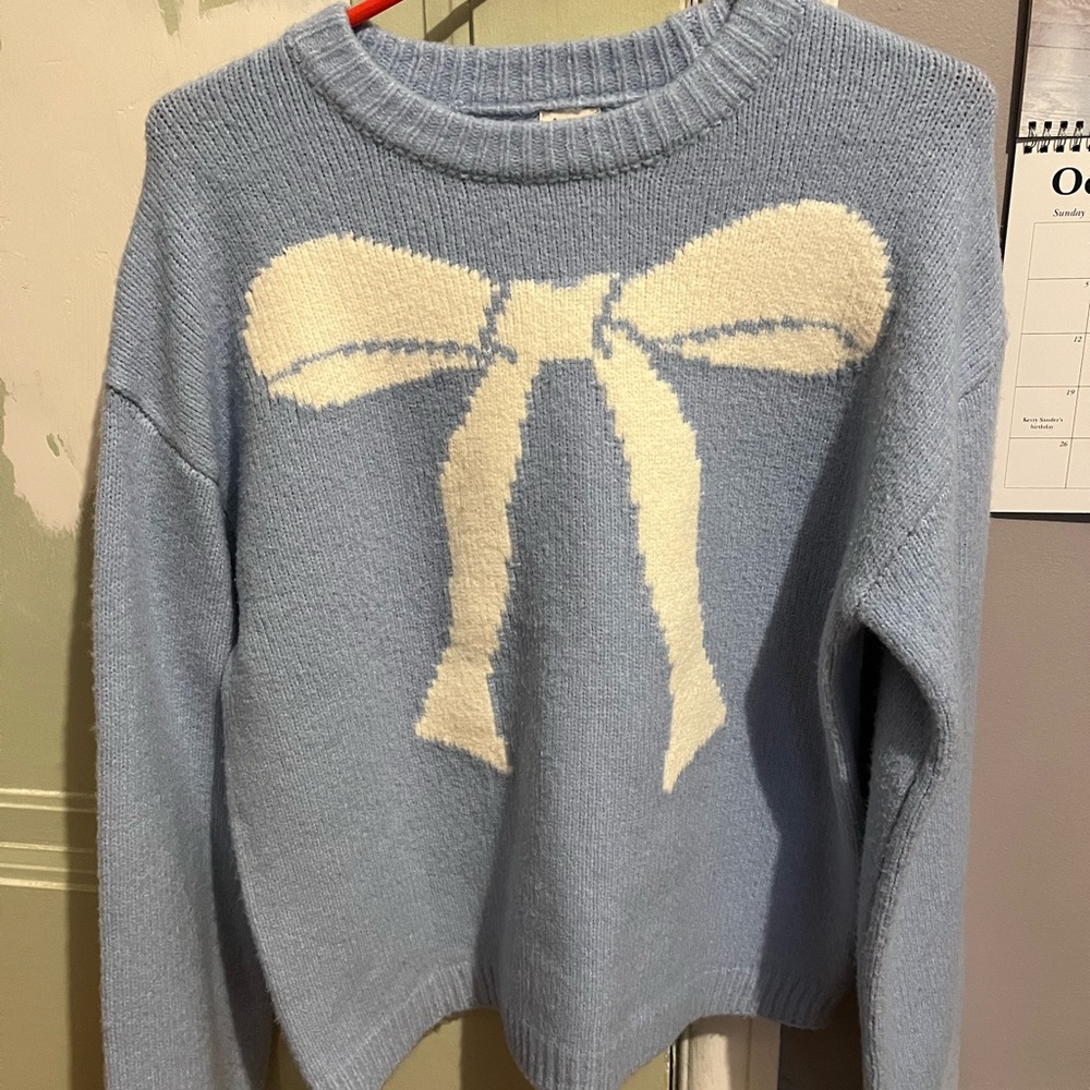 A New Day Sky Blue Sweater with Cream Bow